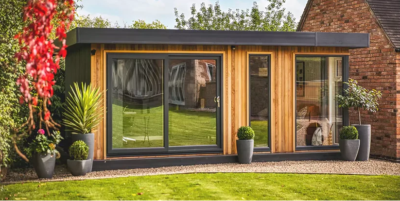 Tuinhuis als werkplek: de voordelen van thuiswerken in de tuin